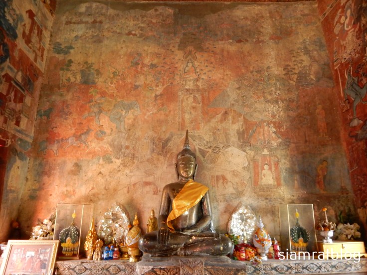 buddha statue and mural