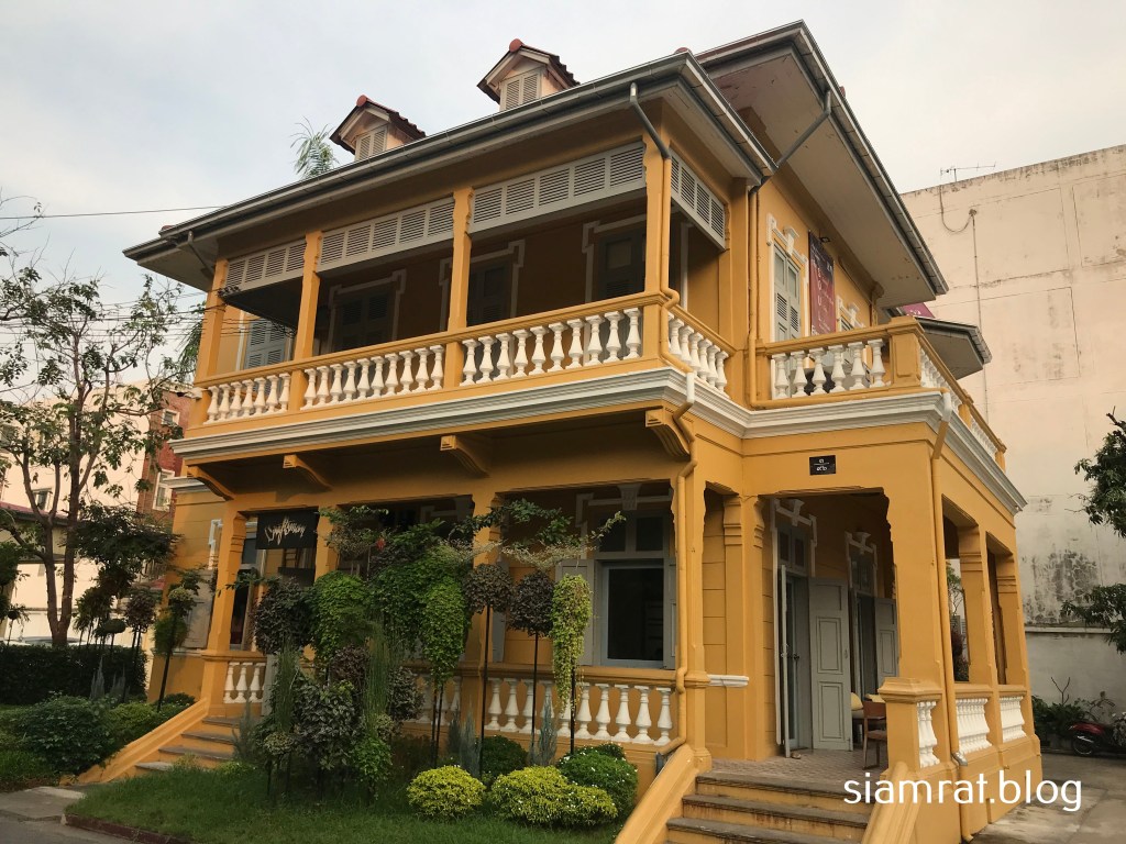 two storey yellow house